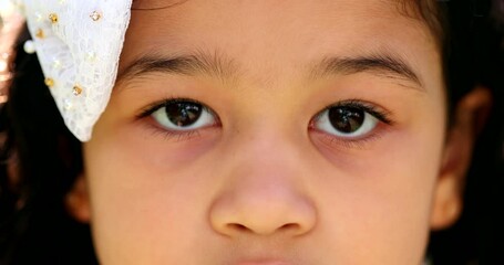 Wall Mural - Child girl portrait, mixed race kid, ethnically diverse kid smile outdoors