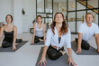 © lithiumphoto - Yoga class of young people group indoor