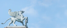Banner With Old Statue Of Medieval Griffin, A Hybrid Of Lion And Bird, On The Top Of The State Opera House In Downtown Of Dresden, Germany, Details, Closeup, With Copy Space For Text.