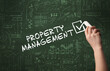 © ra2 studio - Hand drawing PROPERTY MANAGEMENT inscription with white chalk on blackboard, new business concept