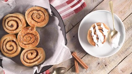 Sticker - Cinnamon buns with chocolate chips baked in a cast iron pan.