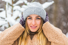 Portrait Of A Beautiful Woman With Braces On Teeth. Smiling Girl With Dental Braces. Happy Smiling Woman With Braces In Winter Nature. Dental Health Concept.