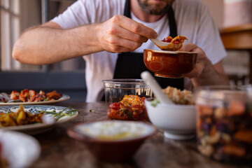 Chef preparing healthy food to take away at home