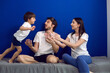 © saulich84 - boy child jumps on parents with acceleration