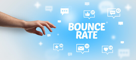 close-up of cropped hand pointing at bounce rate inscription, social networking concept