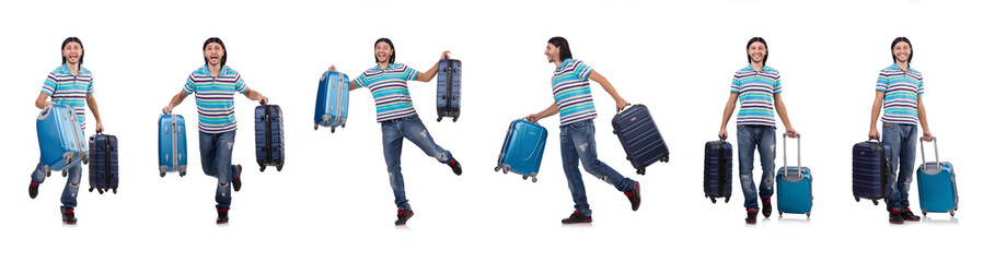 Wall Mural - Young man travelling with suitcases isolated on white