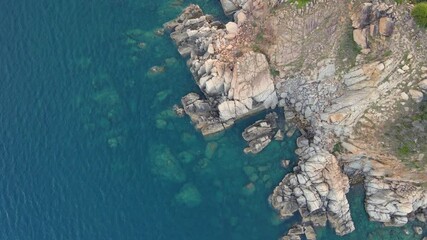 Wall Mural - Aerial shot of shore with rocks