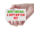 © dolphfyn - Hand showing Christmas 2021