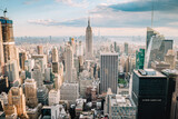 Fototapeta  - Panoramic shot of the New York city skyline on a beautiful sunny day during golden hour