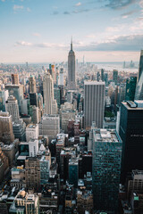 Wall Mural - Panoramic shot of the New York city skyline on a beautiful sunny day during golden hour