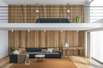 Wooden living room with bed and sofa, modern furniture in home with two floors