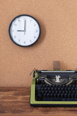 Sticker - vintage typewriter at wooden table near wall with clock