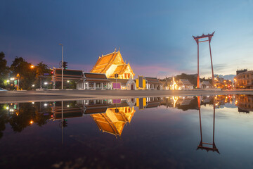 The Giant Swing and Suthat Temple at Twilight Time, in Bangkok Thailand