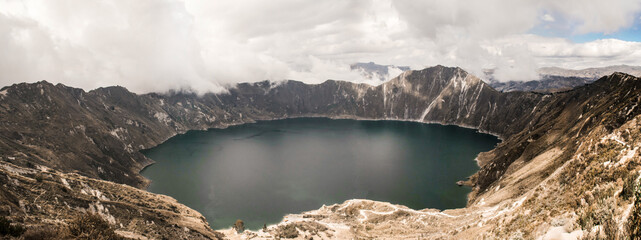 Sticker - Panoramic shot of Kelimutu lake in the crater of a volcano covered with fog in Indonesia