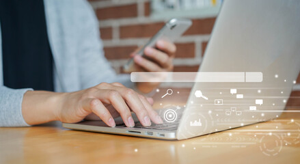 Wall Mural - close up woman hand type on keyboard laptop to use search engine optimization (seo) tools for findin