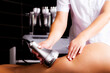 Foot cavitation massage photo. Ultrasonic liposuction procedure.