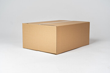 Brown carton box on a white background