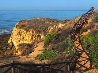 Hiking at the beach of Praia Maria Luisa, Olhos da Agua, Albufeira, at the Algarve coast of Portugal