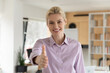 © fizkes - Portrait of pleasant young female hr manager reaching out hand, welcoming job seeker, smiling millennial caucasian businesswoman making greeting gesture, getting acquainted with partners or clients.