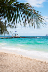 Wall Mural - Beach on the Maithon island.  Palm tree on paradise beach.