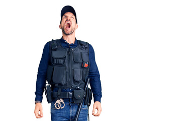 Poster - Young handsome man wearing police uniform angry and mad screaming frustrated and furious, shouting with anger. rage and aggressive concept.