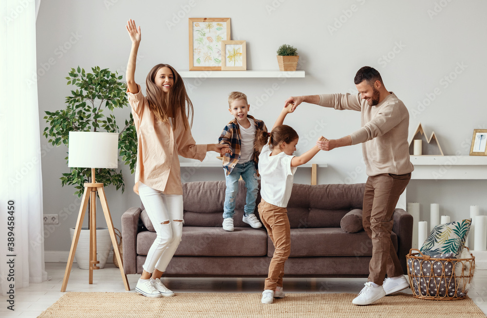 happy family mother father and children dancing at home - obrazy, fototapety, plakaty 