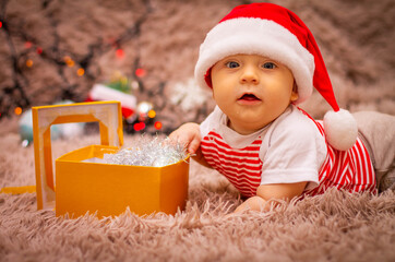 Wall Mural - baby child playing with christmas toys