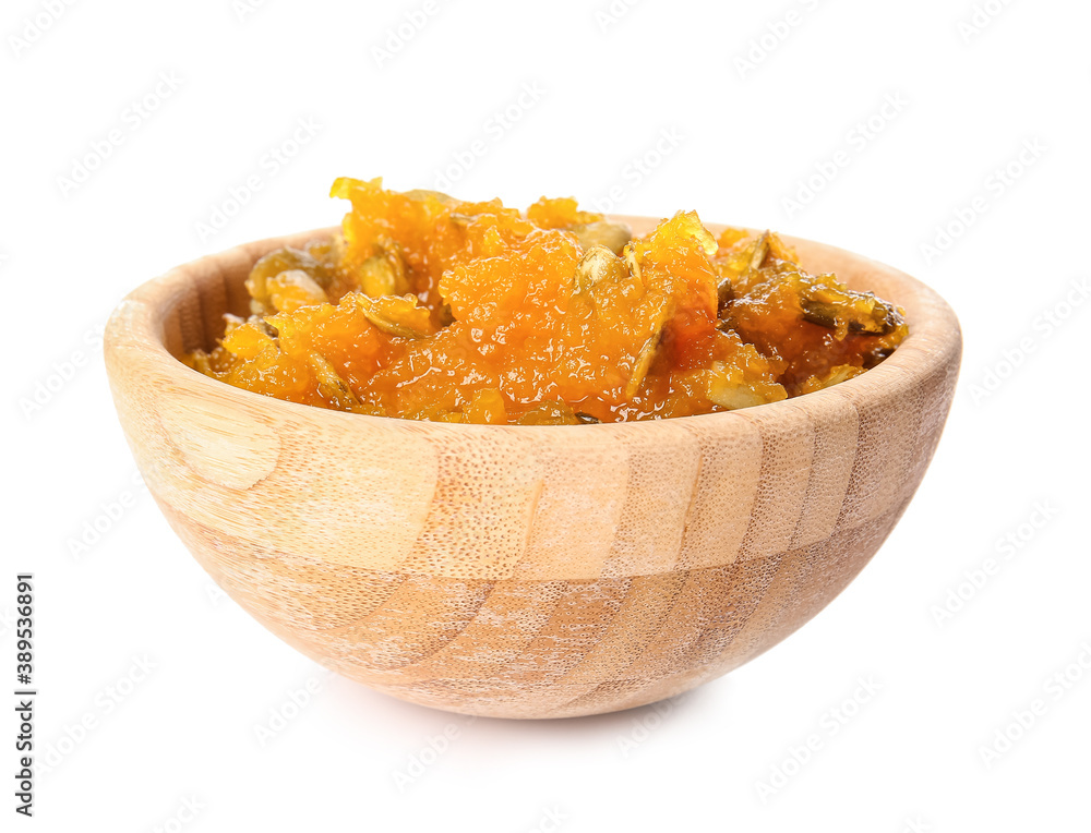 Bowl of tasty pumpkin jam on white background