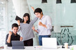 © Morakot - Start-up Asia business team in meeting and helped analyze the marketing problems of the company or beginning new project. Start up concept