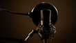 Professional microphone on a dark background