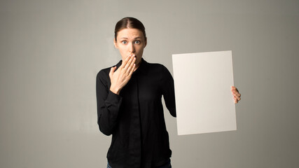 Canvas Print - Girl holding white blank sign