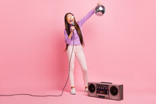Full Size Photo Of Little Kid Girl Sing Song Mic Hold Disco Ball With Retro Boom Box Isolated On Pastel Color Background