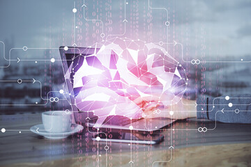 Businessman with computer background with brain theme hologram. Concept of brainstorm. Multi exposure.