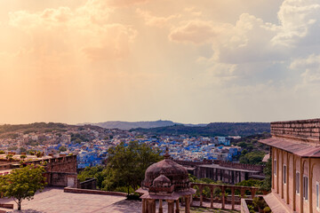 Wall Mural - Panoramic view of Sun city Jodhpur also known as 'Blue City' due to the vivid blue-painted Brahmin houses from balcony of Mehrangarh Fort, Rajasthan, India.