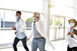 © goodluz - Medical team in emergency department rushing in hallway