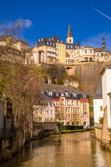 Wall Mural - Vertical shot of beautiful canal in the picturesque Grund neighborhood in Luxembourg-City, Luxembourg