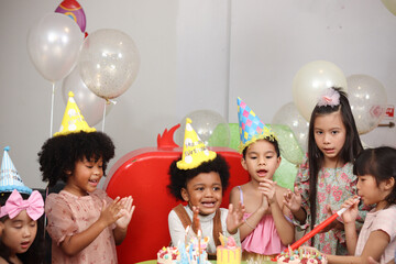 Happy birthday party event, group of adorable kids celebrate birthday party together, happy children have fun together