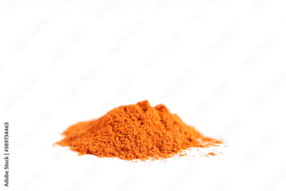 Heap red chili powder or paprika isolated on a white background - obrazy, fototapety, plakaty 