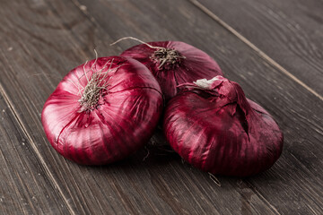 Wall Mural - red onions on rustic wood