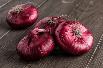 Wall Mural - red onions on rustic wood