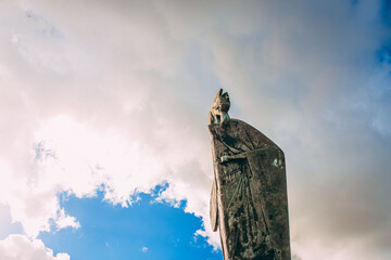 Wall Mural - ANTWERP, BELGIUM - Feb 14, 2014: Minerva Statue and a lamp post in the center of Antwerp