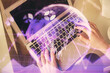 © peshkova - Double exposure of woman hands working on computer and forex chart hologram drawing. Top View. Financial analysis concept.