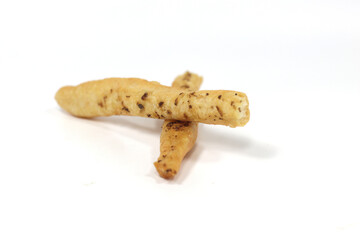 Closeup shot of two breadsticks on a white surface