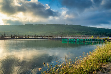 Wall Mural - Aerial view of Ong Cop or Mr Tiger wooden bridge at Phu Yen, Vietnam. This is the longest wooden bridge in Vietnam