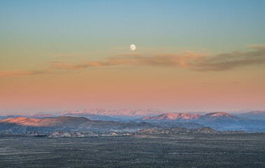 Rainbow cast sunset moonrise