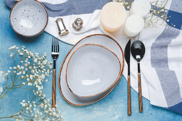 Beautiful table setting on color background