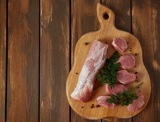 Poster - pork tenderloin on wooden surface