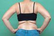 Woman from behind with a stout waist, corpulent waist