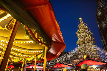 Wall Mural - Traditional Christmas market in Europe, Cologne, Germany - Main town square with decorated tree and lights - Christmas fair concept.