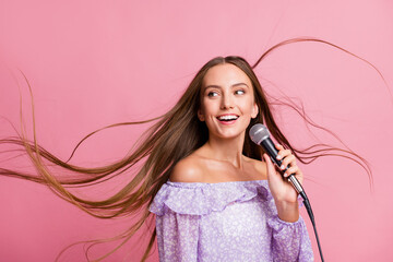 Sticker - Photo of shiny talented teenager lady dressed casual violet clothes singing looking empty space isolated pastel pink color background